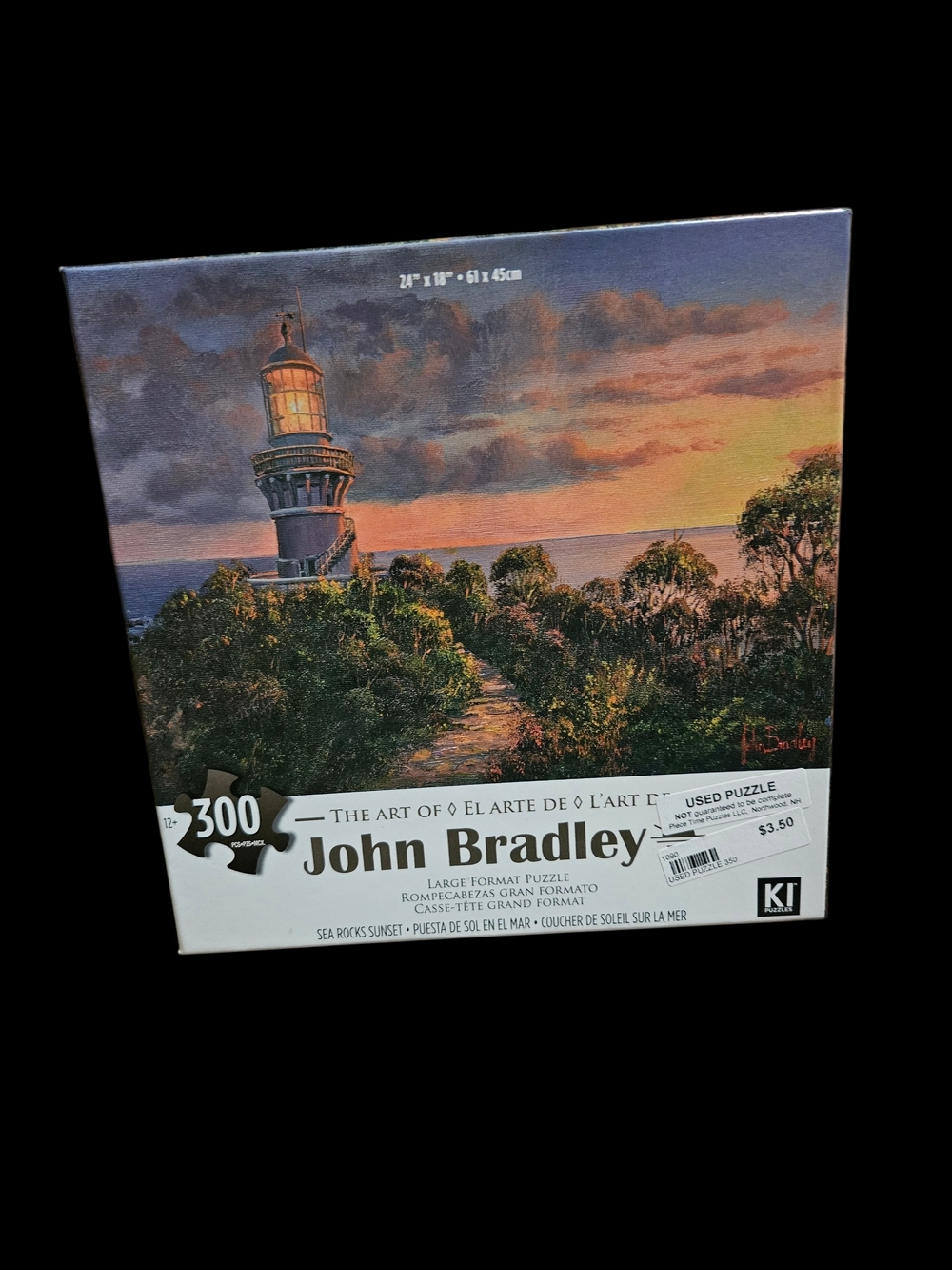 John Bradley 300-Piece Jigsaw Puzzle - Lighthouse Sunset
